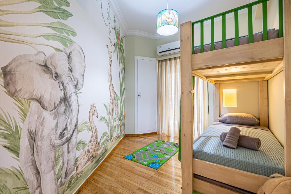 Child's room with bunk bed at Periklis Luxury Apartment-Faliroy 6_Koukaki