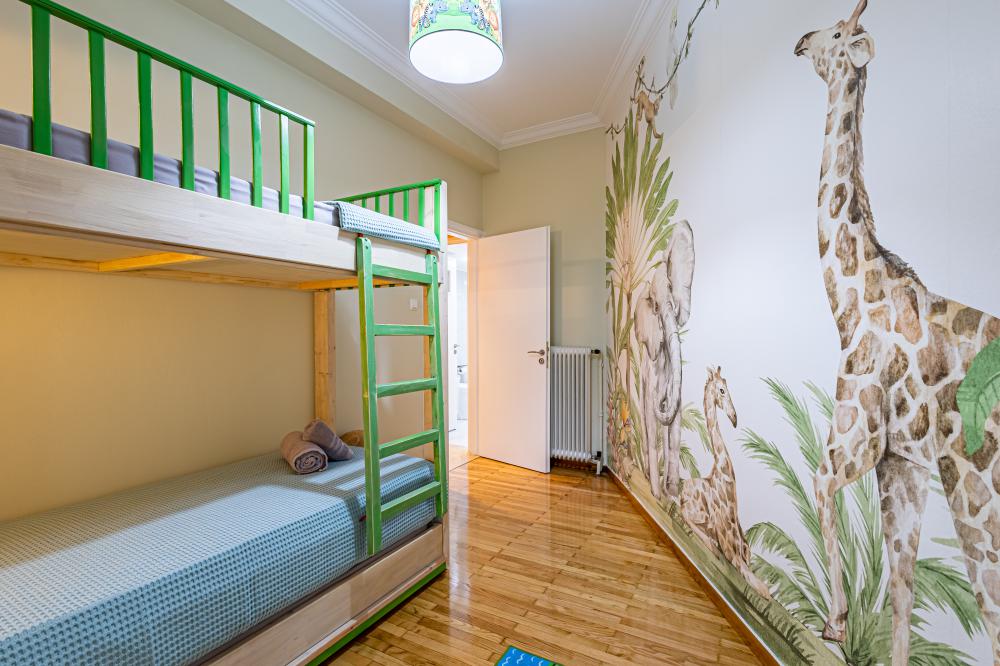 Child's room with bunk bed at Periklis Luxury Apartment-Faliroy 6_Koukaki