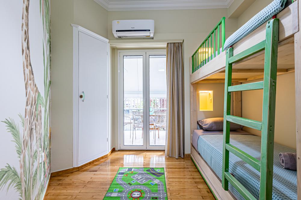 Child's room with bunk bed at Periklis Luxury Apartment-Faliroy 6_Koukaki