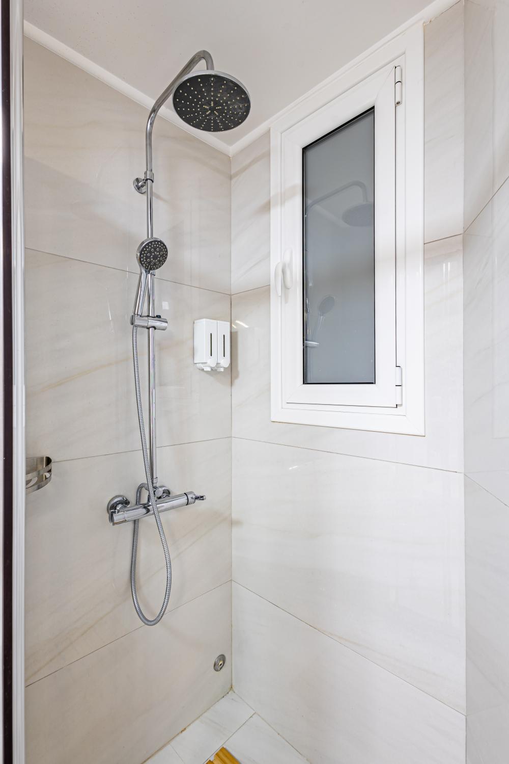 Shower Column of Main Bathroom at Priklis Luxury Apartment Faliroy 6_Koukaki